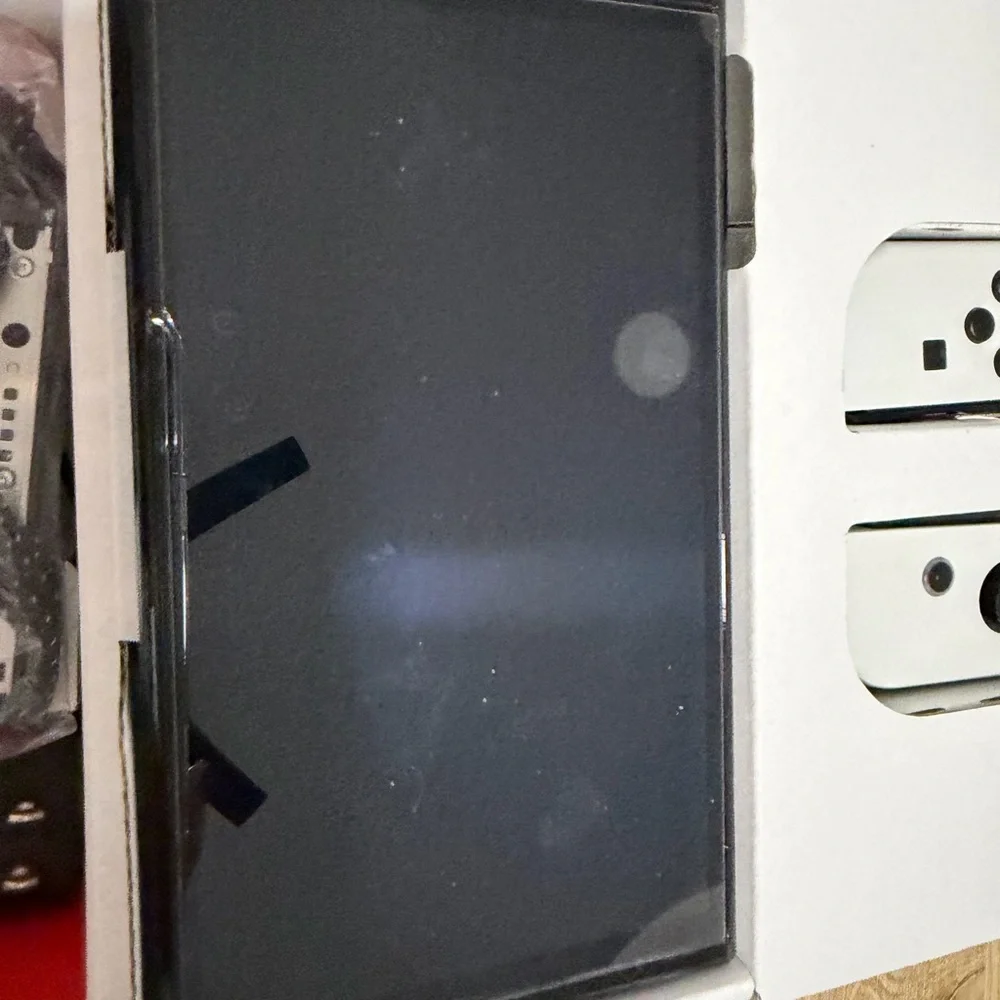 Nintendo Switch OLED (White) bundle. comes with all original parts and cords.